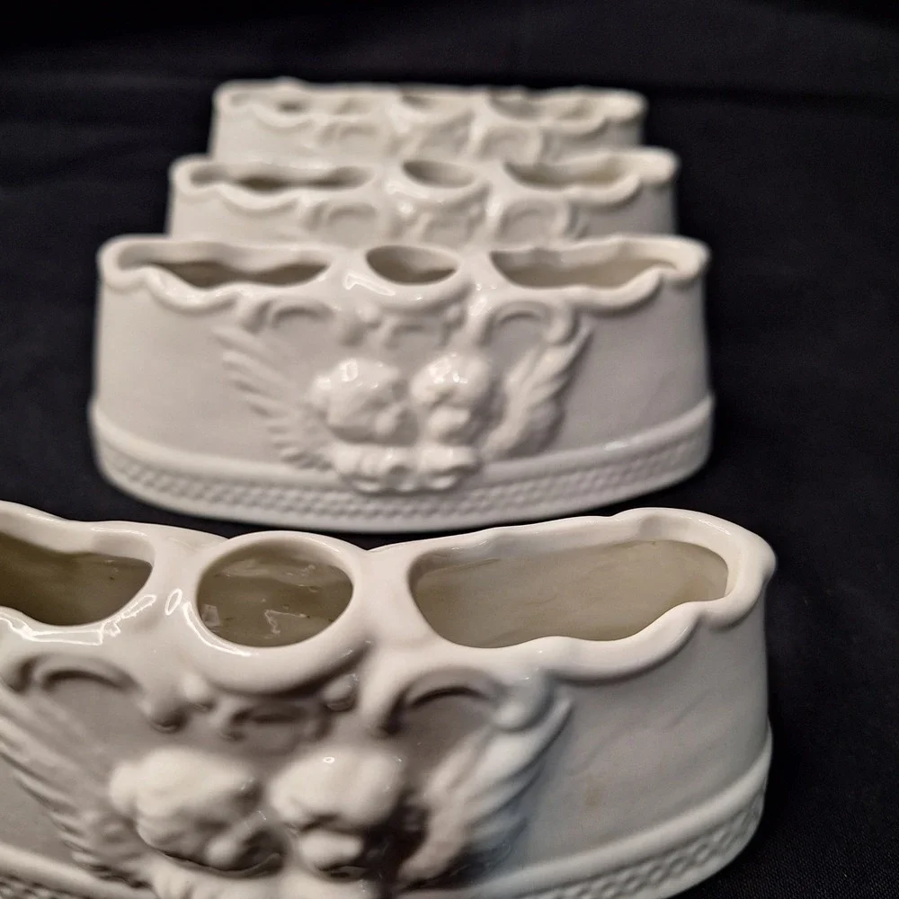 Set of 4 White Glazed‎ Dresden Porcelain Cherub Crescent Flower Candle Holders